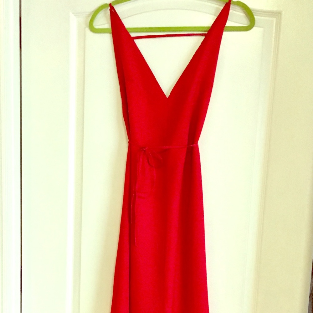 Red v-neck, low back maxi dress with tie waist